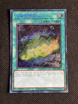 YuGiOh! - Cynet Mining RA03-EN067 Secret Rare 1st Edition Near Mint - Image 1