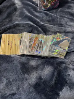 50+ Gold And Tag Team Pokemon Cards With Sleeves - Image 1