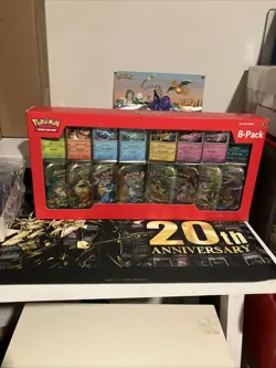 Pokemon TCG Prismatic Evolutions Mini Tin Display Case Sealed Tins, 8-Pack - Image 1