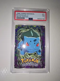 1999 TOPPS POKEMON THE MOVIE EDITION #E1 BULBASAUR #1 PSA 7 - Image 1
