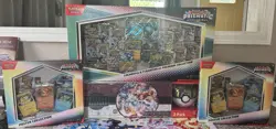 Pokemon Prismatic Premium Collection, 2 PE Posters, HolidayCalendar/Pokeball Tin - Image 1