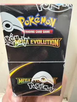 Pokemon TCG Mega Evolution Half Booster Box SEALED (18 packs) in hand - Image 2