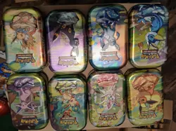 Pokemon TCG Prismatic Evolutions Set Of 8 Sealed Mini Tins W Open Display Box - Image 4