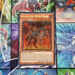 Red-Eyes Black Meteor Dragon MP24-EN107 25th Anniversary Tin: Dueling Mirrors... - Image 1