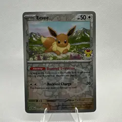Eevee - 074/131 (Pokemon Day 2025) (Reverse Cosmos Holo) - Image 1