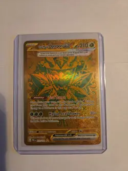 Pokemon TCG Sv: Prismatic Evolutions Teal Mask Ogerpon EX Gold 177/131 - Image 1