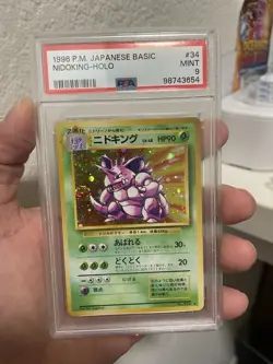 1996 POKEMON BASE SET JAPANESE #34 NIDOKING-HOLO PSA 9 Swirl - Image 1