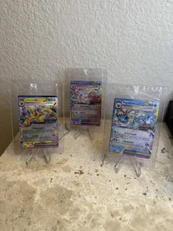 Prismatic Evolutions Surprise Box Sealed Stamped EX Promo Cards 3/9 Set - Image 1