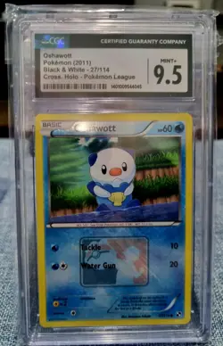 Oshawott Pokemon 2011 black and white 27/114 cross holo 9.5 CGC grade - Image 1
