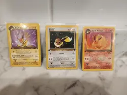 Pokemon Card Set: Dark Jolteon, Eevee, Dark Flareon 1st Edition - Image 1