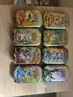 Pokemon TCG Prismatic Evolutions Mini Tins Empty, Full Set Of 8,No Booster Packs - Image 1