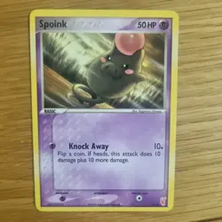 SPOINK 7/12 POKEMON CARD (PLUSLE & MINUM TRAINER KIT SET) - Image 1