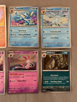 Pokemon Prismatic Evolutions Costco Mini Tin Cosmo Promos (8) Umbreon Sylveon - Image 3