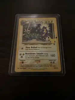 Light Toxtricity SWSH137 Celebrations Promo Holo Rare M NM Card - Image 1
