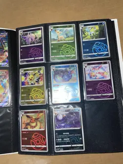 Eevee Prismatic Binder Filled with Eevee/Lutions Pokemon Cards - Image 4