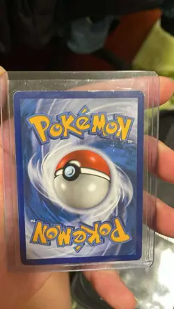 2019 Pokemon Promo SM228 Armored Mewtwo Holo Card LP-MP Condition - Image 2