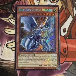YUGIOH BLUE-EYES SHINING DRAGON LCKC-EN008 SECRET UNLIMITED ED NM - Image 1