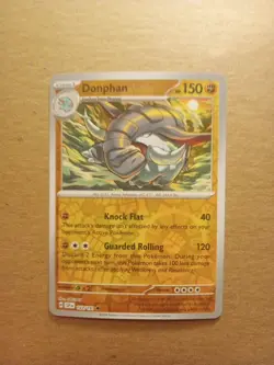 Donphan #103/191 SV Surging Sparks 2024 Reverse Holo Common Pokemon TCG Card - Image 1