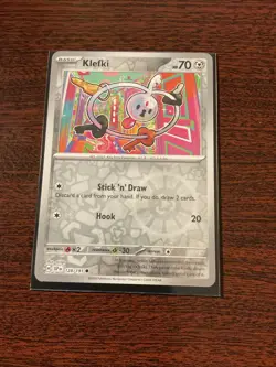 Klefki 128/191 Sv08: Surging Sparks Reverse Holo With Card Sleeve - Image 1
