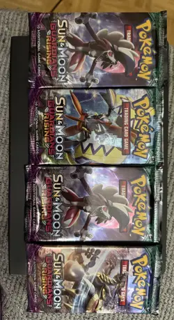 4 Pokemon TCG Sun And Moon Guardians Rising Booster Packs - Image 1