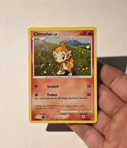 Pokemon Chimchar 76/130 Diamond and Pearl Cosmos Holo Rare LP - Image 3