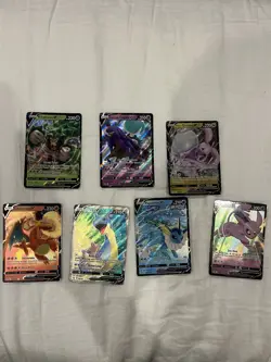 Pokemon TCG Bundle 7 V Cards Mixed Sets - Lapras, Charizard, Espeon, Vaporeon - Image 1