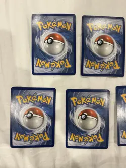 Pokemon TCG Bundle 7 V Cards Mixed Sets - Lapras, Charizard, Espeon, Vaporeon - Image 4