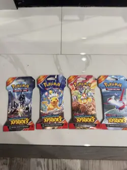 Pokemon TCG Surging Sparks 4 Pack Art Set sleeved booster pack - Image 1