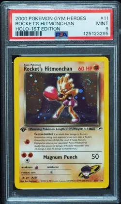 1st Edition Rocket's Hitmonchan 11/132 PSA 9 Gym Heroes Pokemon Card, Swirl! - Image 1