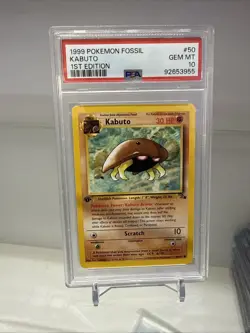 1999 POKEMON FOSSIL KABUTO 1ST EDITION #50 PSA 10 GEM MINT - Image 1