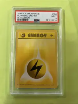 Pokemon 1st Edition Base Set Lightning Energy 100/102 PSA 9 - Image 1