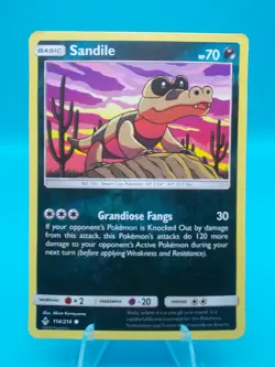 Sandile 114/214 S&M Unbroken Bonds Pokemon TCG Reverse Holo Lightly Played - Image 1