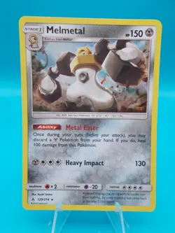 Melmetal 129/214 Sm-Unbroken Bonds Pokemon TCG Holo Lightly Played - Image 1