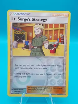 Lt. Surge's Strategy 178/214 Sm-Unbroken Bonds Pokemon TCG Reverse Holo NM/M - Image 1