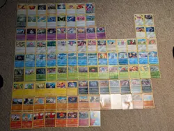105 Assorted Pokemon Trading Card Game Cards, Including Holos, Trainers - Image 1