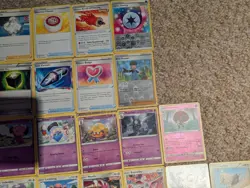 105 Assorted Pokemon Trading Card Game Cards, Including Holos, Trainers - Image 3