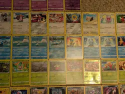 105 Assorted Pokemon Trading Card Game Cards, Including Holos, Trainers - Image 5