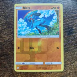 Riolu 115/236 - NM REVERSE HOLO SM Unified Minds - Pokemon 2019 Common TCG Card - Image 1