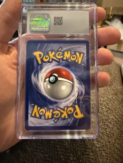 1999 Pokemon Dragonite Black Star Movie Promo 5 CGC 9.5 Minor Scratch - Image 2