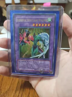 Yugioh Elemental Hero Flame WIngman TLM-EN035 Ultimate Rare 1st Edition UDE LP - Image 1