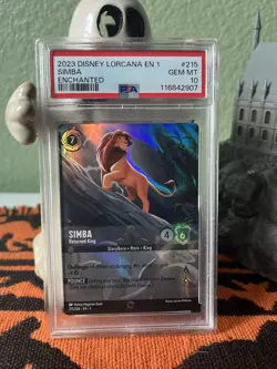 2023 DISNEY LORCANA EN 1-ENCHANTED #215 SIMBA - RETURNED KING PSA 10 - Image 1