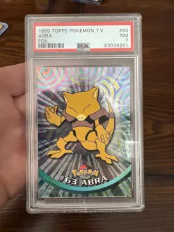 1999 Topps Pokemon TV #63 Abra Foil Logo Blu PSA 7 NM - Image 1