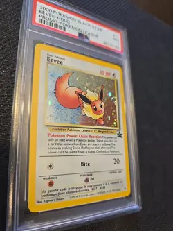 2000 POKEMON BLACK STAR PROMO #11 EEVEE - HOLO POKEMON LEAGUE PSA 7 - Image 1