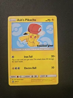 Ash’s Pikachu SM113 Ultra Rare Non Holo Exclusive Promo Pokemon Card - Image 1