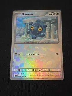 Bronzor (Master Ball Pattern) 066/131 Sv: Prismatic Evolutions Pokemon TCG NM - Image 1