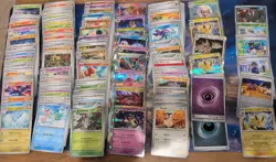 Lot Of 184 Pokemon Cards, Surging Sparks, Prismatic Evolutions - Image 1