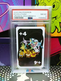 Pokemon PSA 8 Uno 2020 Pokemon Eeveelutions Japanese Back-Wild-Draw 4 NM - Image 1
