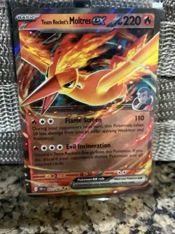 Pokemon TCG Team Rockets Moltres EX Holo Rare Card 31/182 NM Condition - Image 1
