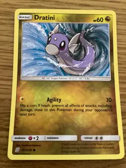 Dratini Pokemon Card 147/236 Reverse Holo- Used -Sun & Moon-Unified Minds - Image 1