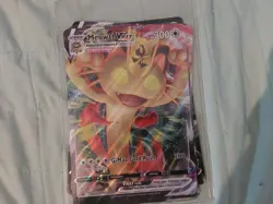 2 pokemon binders and 9 big cards in a Protective case. - Image 1